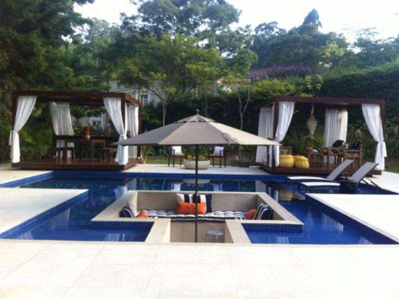 Se inspire nessa linda piscina charmosa e aconchegante